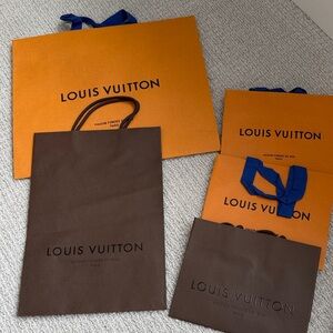 Assortment of Louis Vuitton Orange and Brown Shopping Bags Bundle